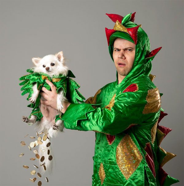 piff the magic dragon holding Mr. Piffles the chihauhua